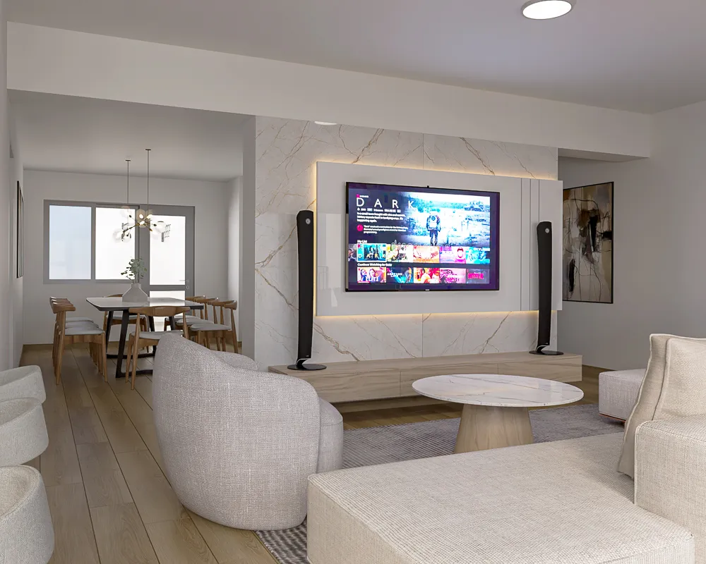 Sala de estar minimalista con panel de TV de mármol y vista al comedor de fondo.