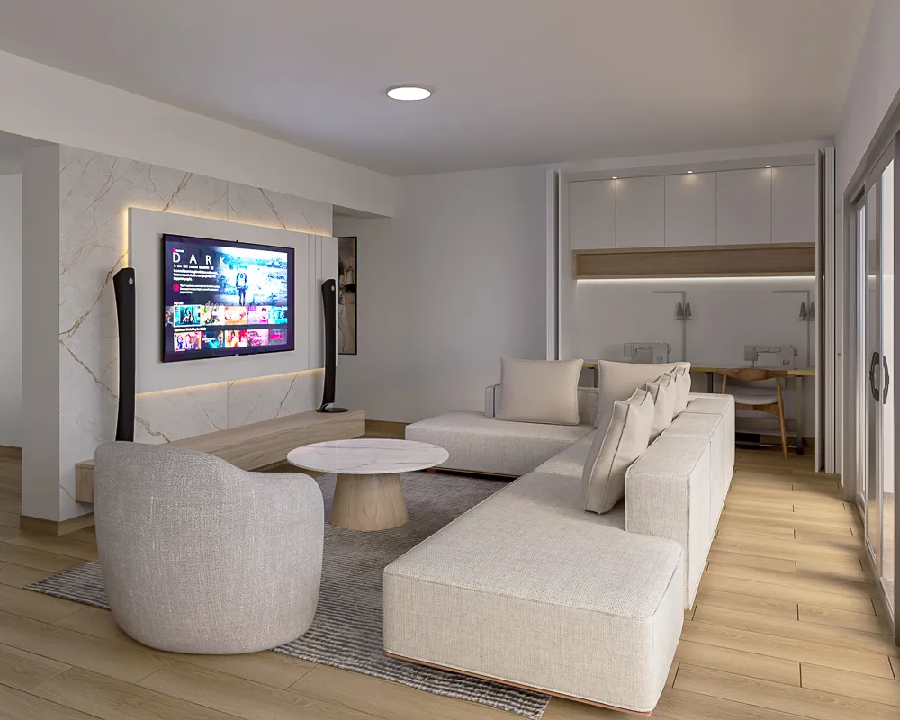 Vista general de la sala con sofá seccional y estación de estudio integrada en el mueble.