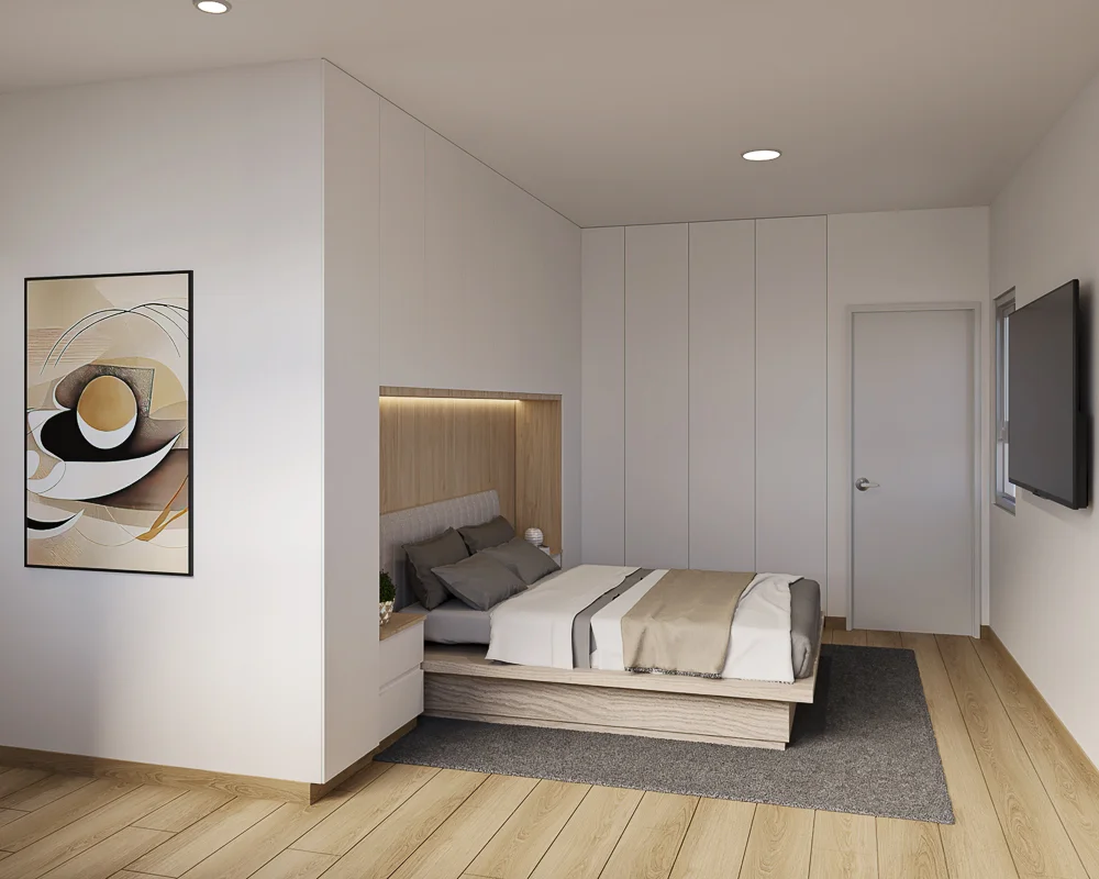 Vista lateral del dormitorio principal mostrando la cama, clóset y TV en la pared.